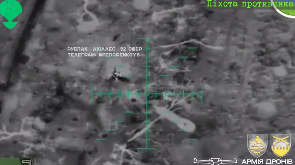 Ukrainian drone drops a bomb on Russian soldiers in Bakhmut direction, Ukraine in undated footage. The footage was released by the ACHILLES Company of strike unmanned aerial systems of the 92nd Separate Brigade on Sunday, Jan. 21, 2024. (@Achilles92OSHBr/Newsflash)