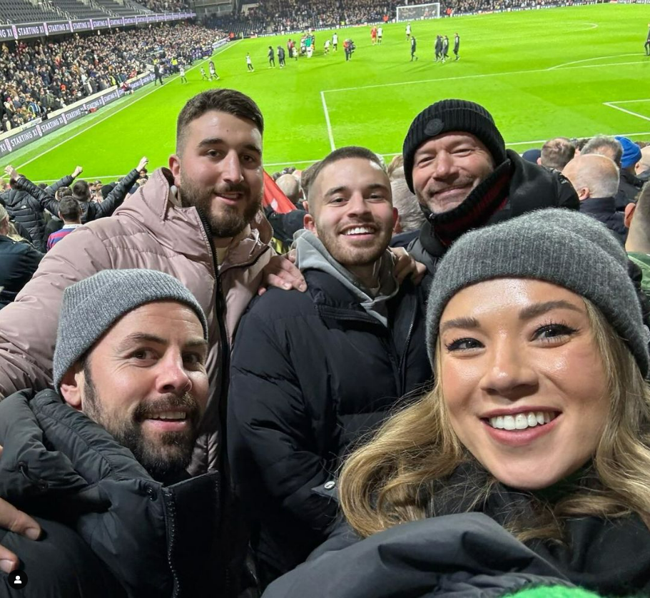 Alan Shearer watches Newcastle's win over Fulham in the away end with children Will, centre, and Chloe