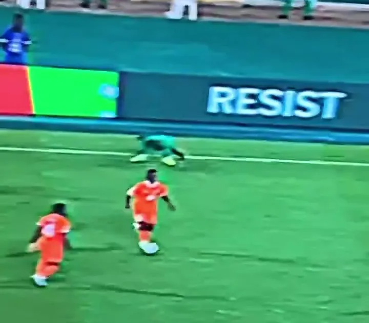 The Senegal player fell over by the far touchline after being dispossessed