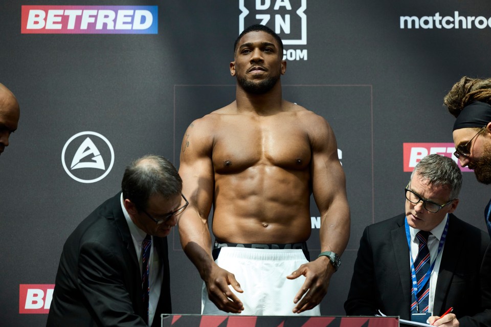 Anthony Joshua is the bigger man of the duo - standing at a whopping 6'6