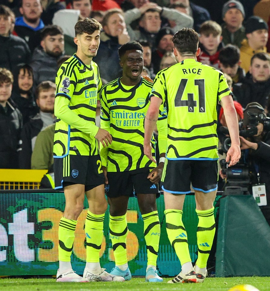 Arsenal’s Bukayo Saka celebrates scoring the winning goal