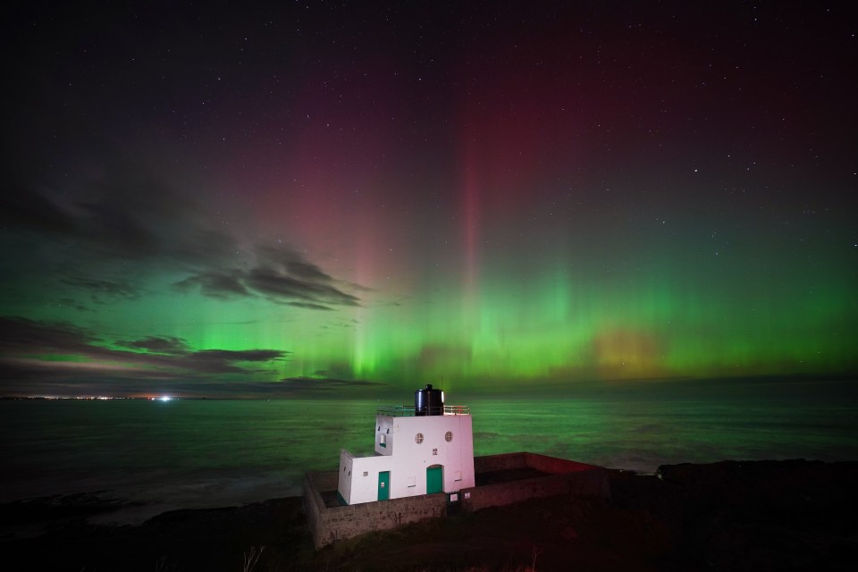 The Northern Lights can sometimes be seen at Bamburgh in Northumberland