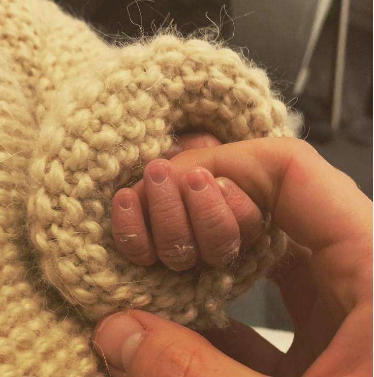 She shared a snap on Instagram of the new arrival clutching her finger