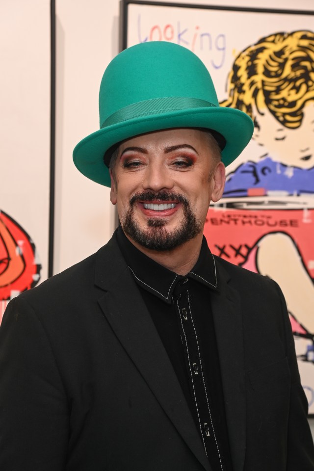 Boy George has reignited his feud with Madonna, saying the superstar is 'full of herself'