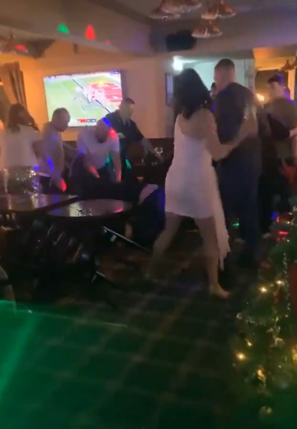 The shocking moment women got involved in a New Year's Eve pub brawl has been caught on camera