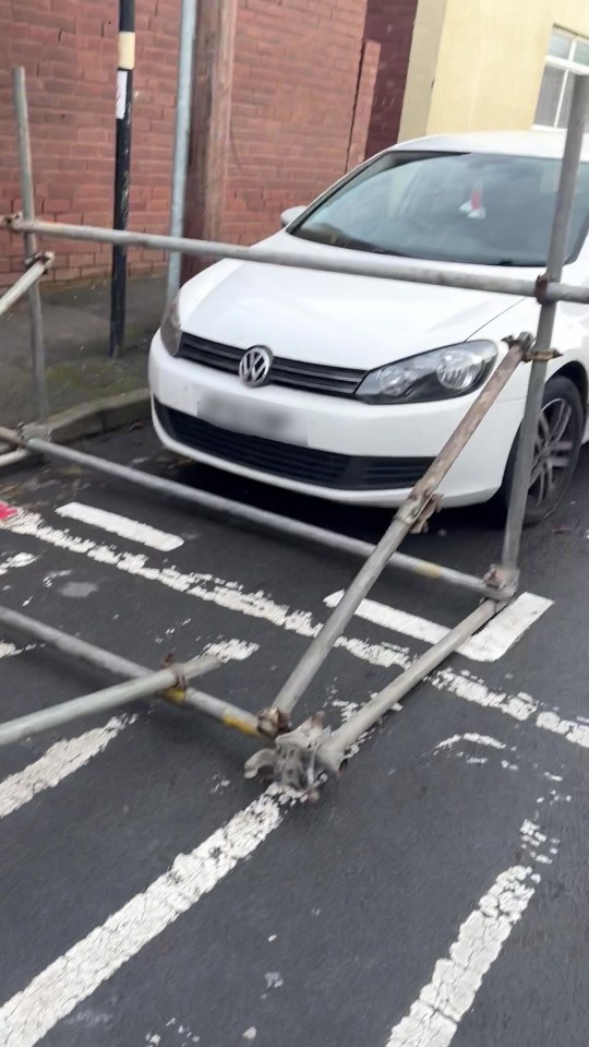 The scaffolders got their 'revenge' by building a barrier