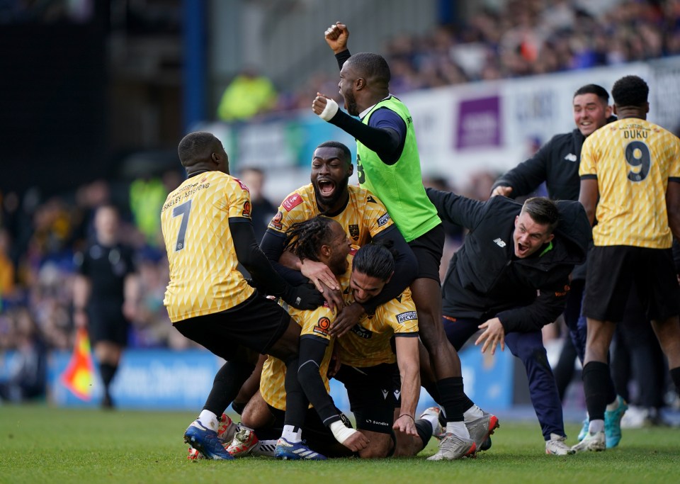 The whole Maidstone team, including substitutes, joined in with Maidstone's celebrations