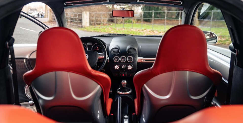 The burnt orange interior is fully original