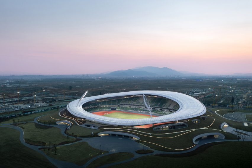 The stadium has been dubbed 'a piece of land art' for how it seemlessly blends in to the surronding area