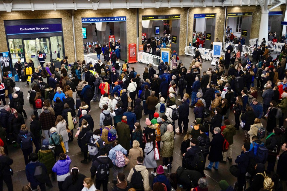 Commuters waiting for updates at King’s Cross station