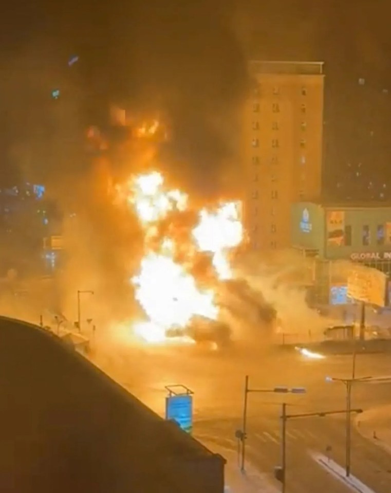 Thick black smoke pours into the sky after the explosion