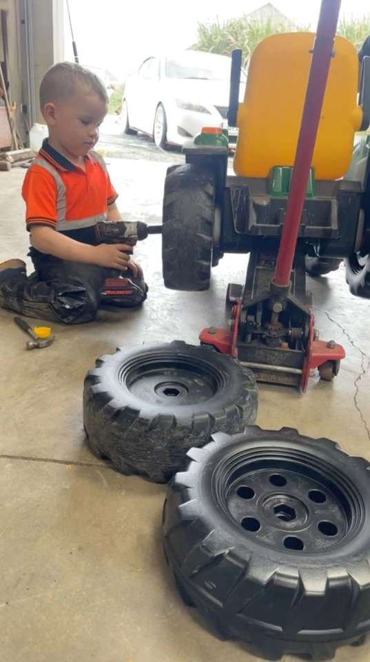 The little mechanic-in-training even works with power tools under his dad's supervision