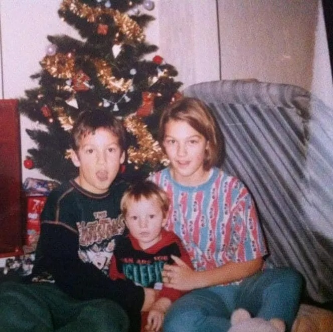 Scott, seen here with Stephanie and their brother Russell, says the family had even spent Christmases with her killer