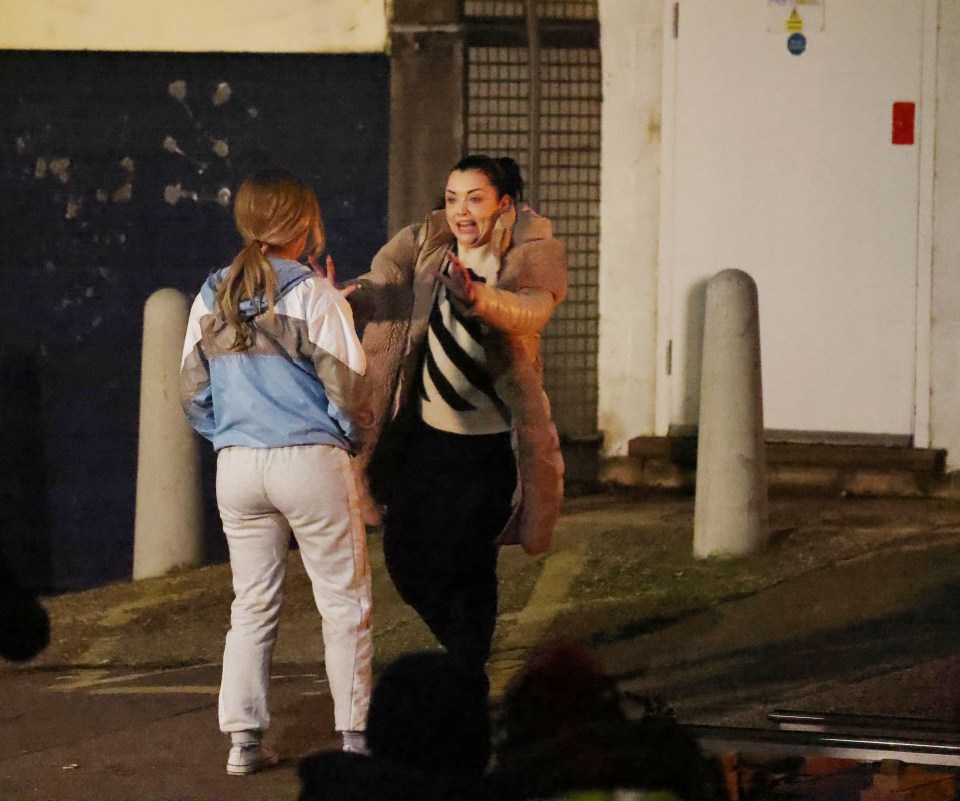 She faces a girl looking for food in bins at the community centre