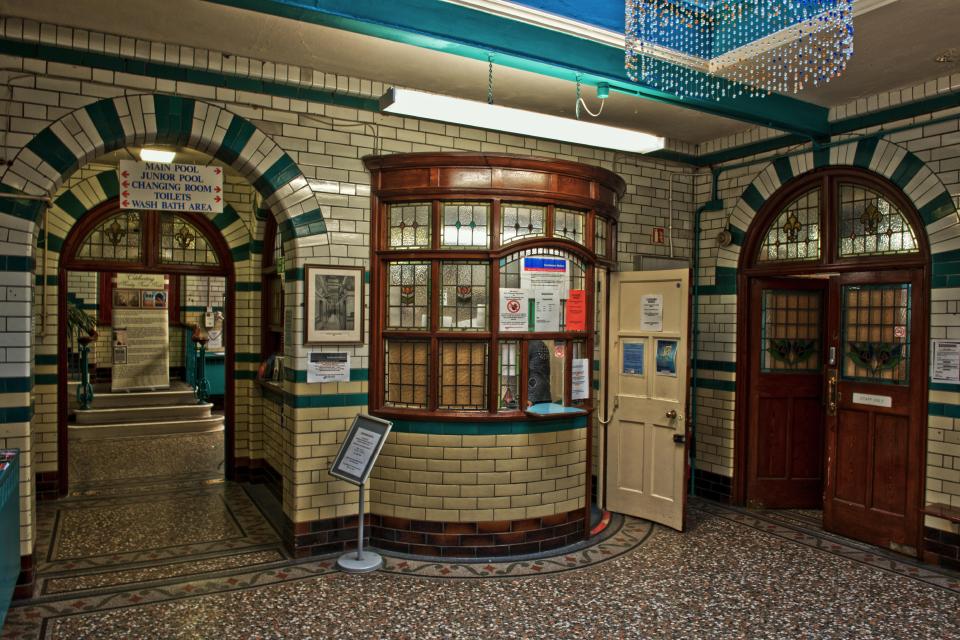 The pool has kept many of it's original features, including the ticket hall