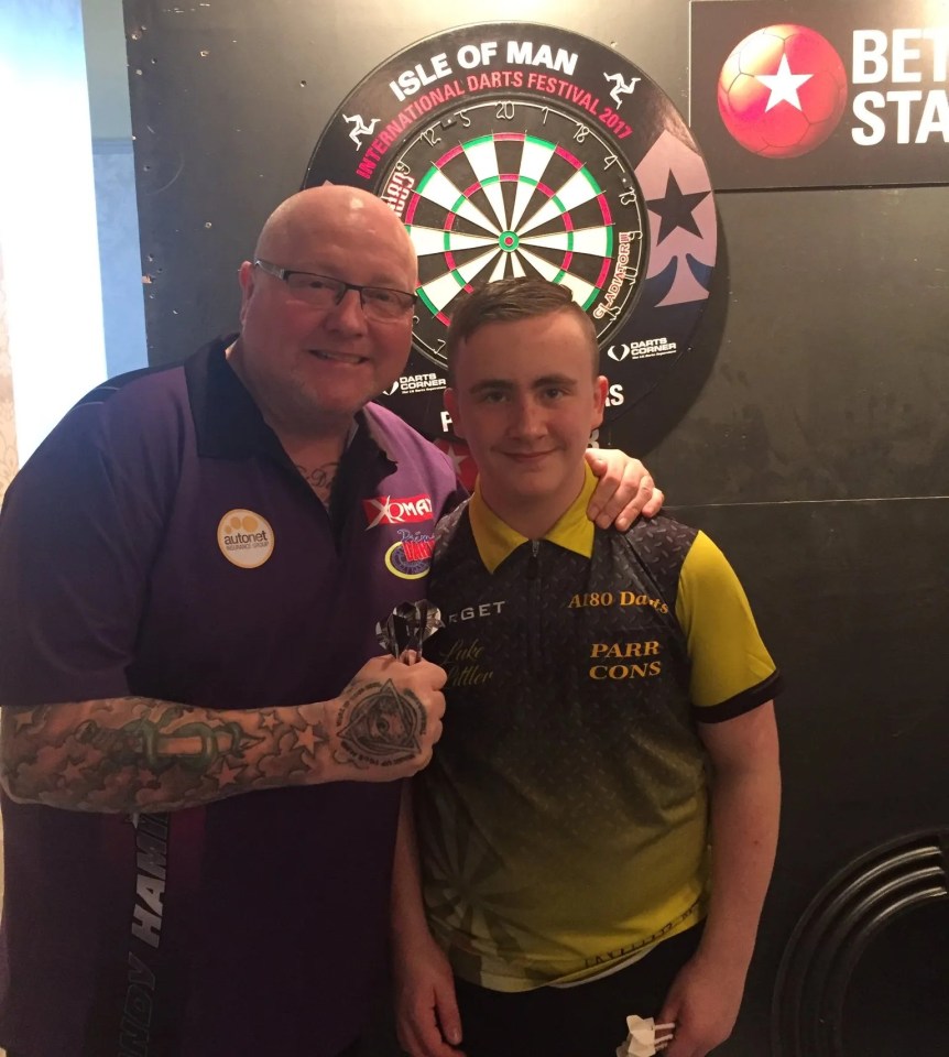 Littler posing with Andy Hamilton who reached the final of the world championships in 2012