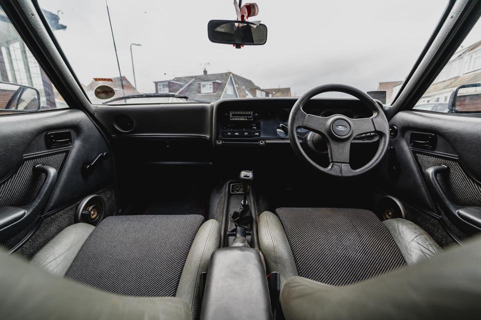 Interior of the car is well-maintained and comes with a Pioneer audio system