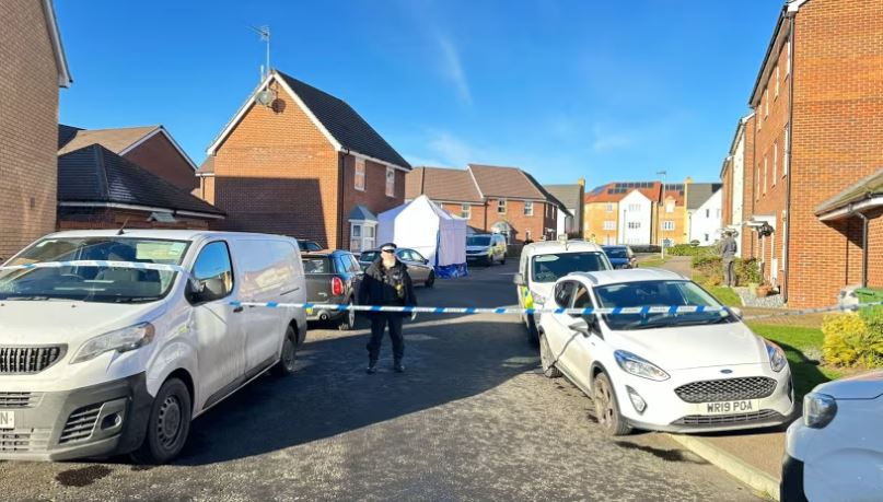 A white forensic tent can be seen on the road today