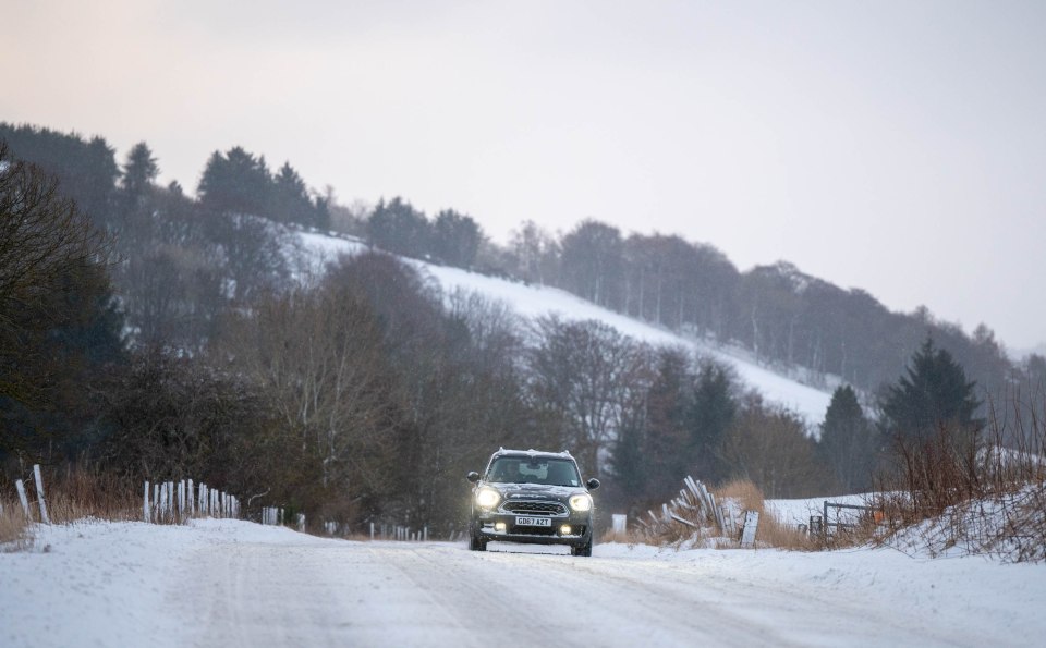 A car driver ventures out on an icy A97 Rhynie to Huntly road tody as motorists have been warned they could end up getting stranded