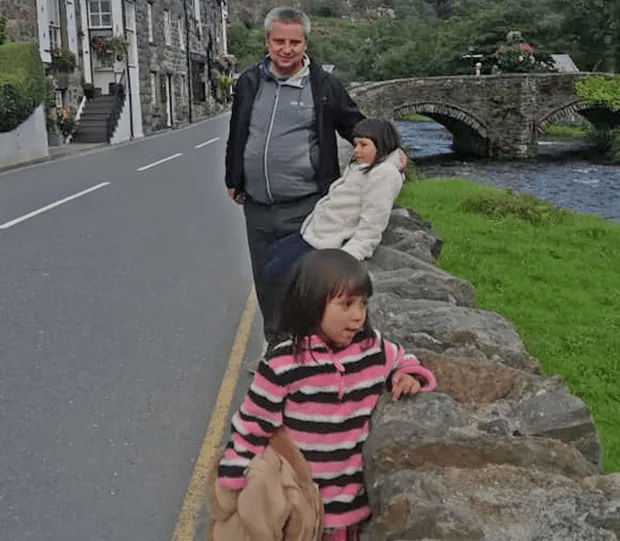 Bartlomiej Kuczynski (pictured) was found dead alongside his daughters