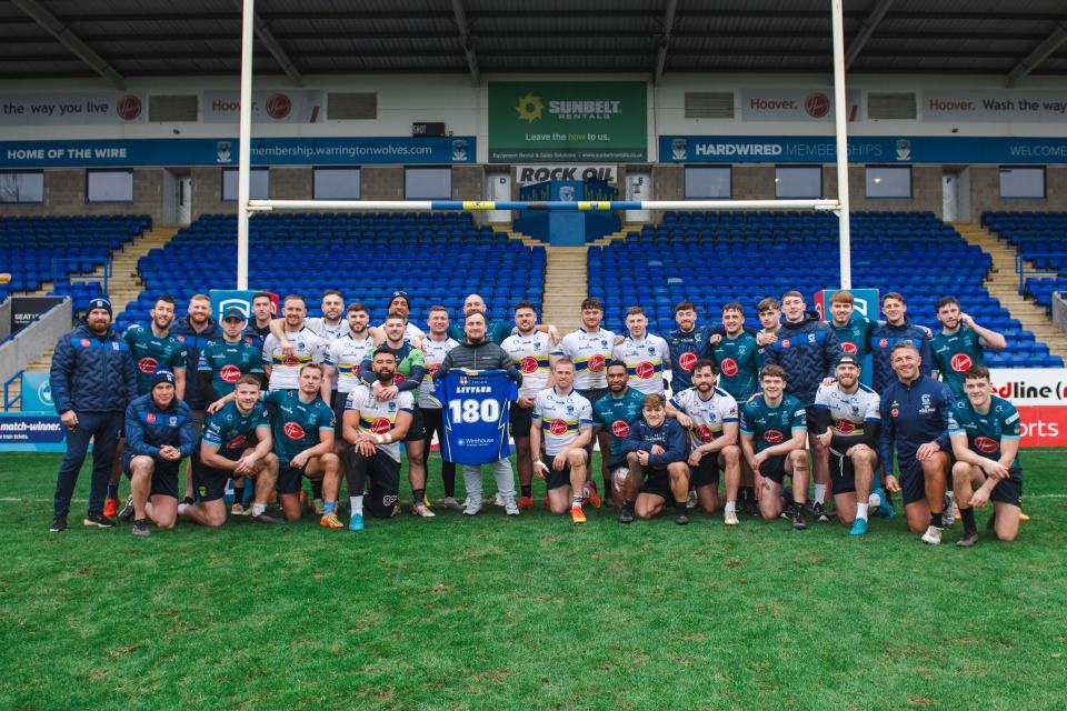 The Nuke was seen posing alongside the Warrington Wolves team