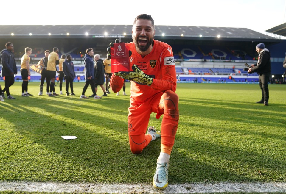 Lucas Covolan celebrates with the Man of the Match award after Maidstone's famous win