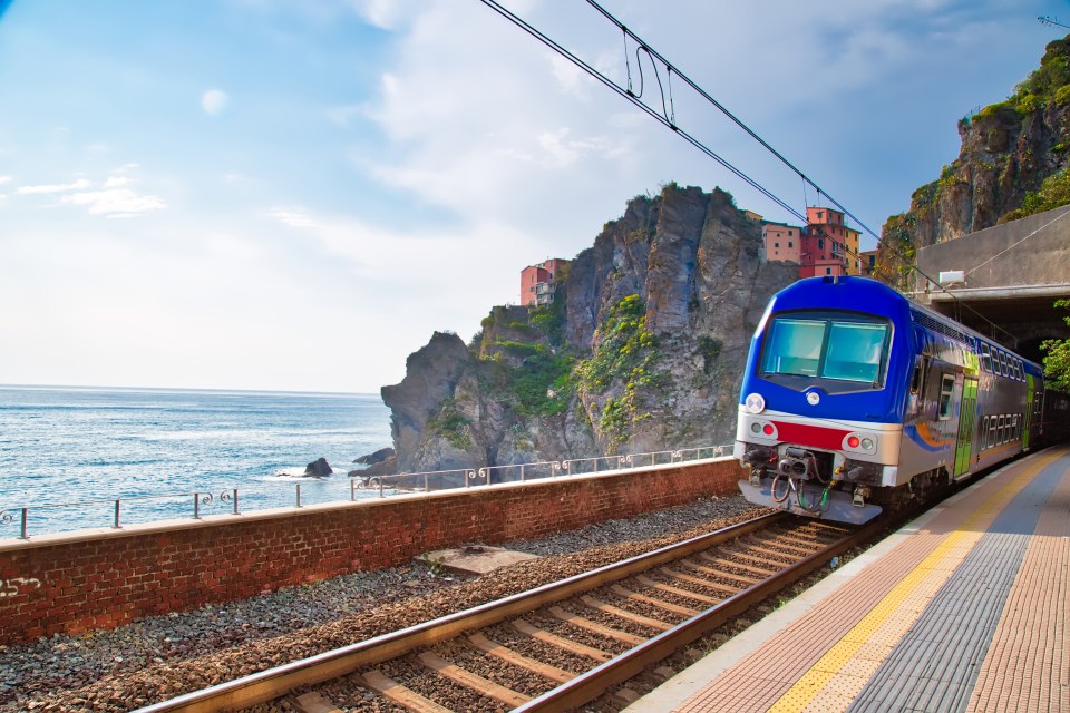 The train journey promises sea views as well as glimpses of the colourful houses