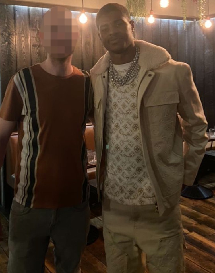 Rashford, posing with a restaurant worker on Thursday afternoon