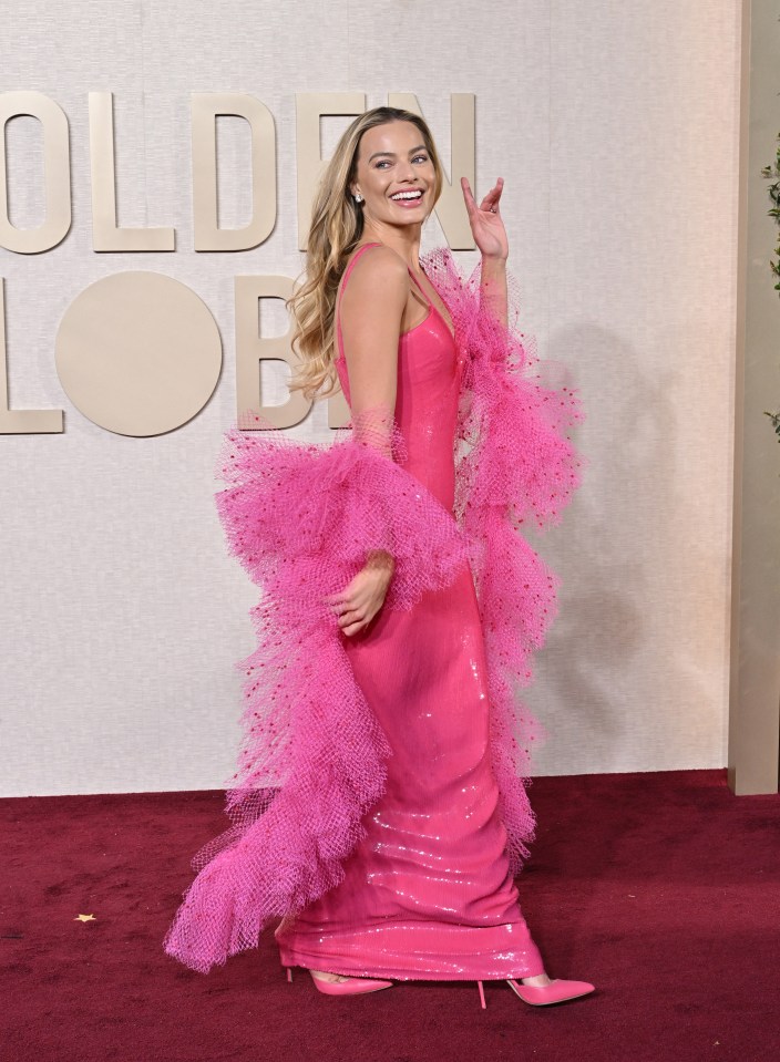 Margot Robbie at the Golden Globes, where jokes about big boobs, reduced the Oscar-tipped feminist Barbie movie to a bit of nonsense drivel