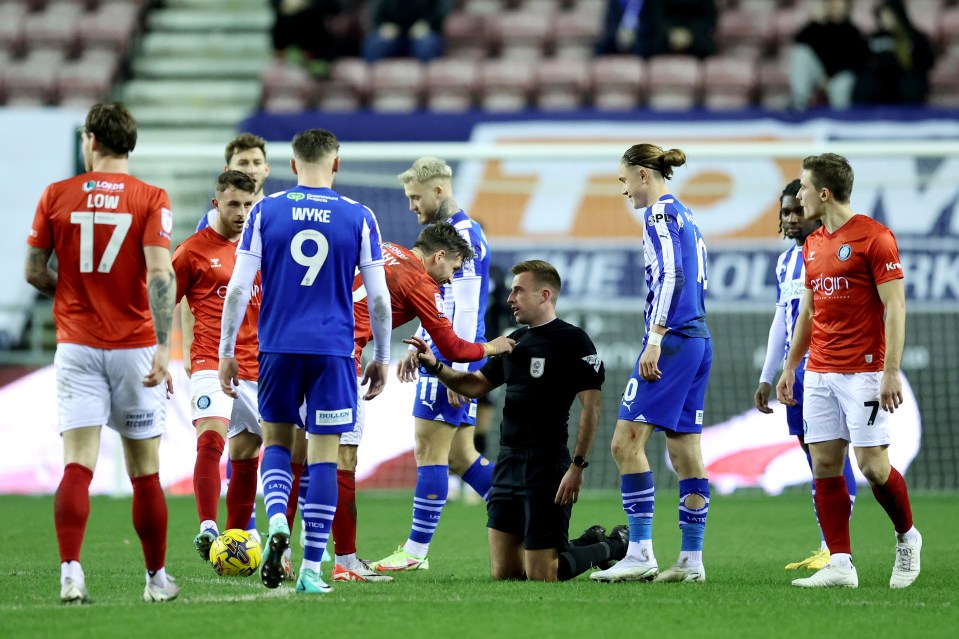 The incident occurred as Wigan scored a 110th winner against Wycombe in League One