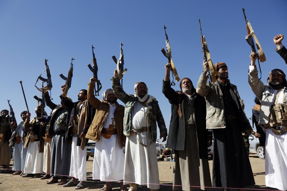 Members of different tribes shout anti-US slogans with guns in their hands as they stage a protest against the US and UK's defensive strikes against Yemen’s Houthi terrorists