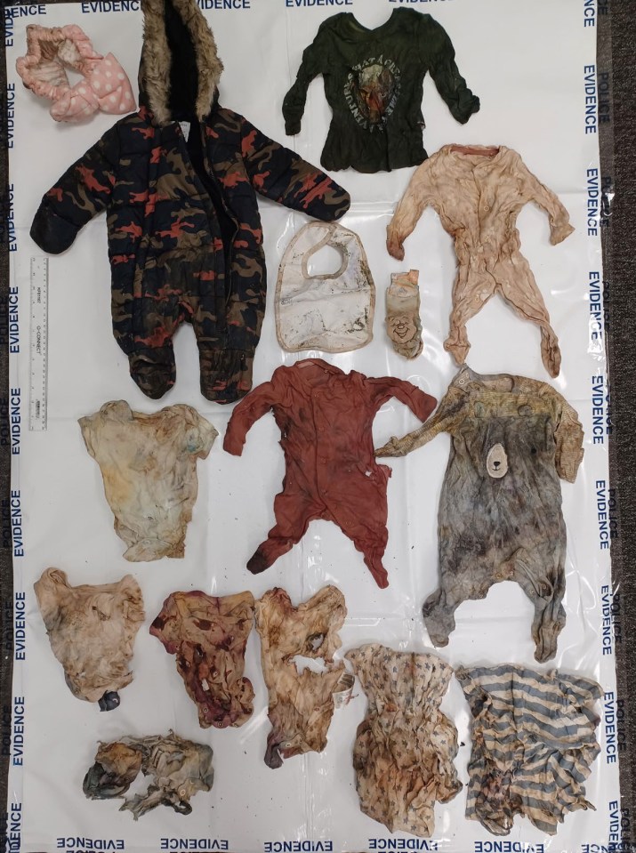 Baby clothing found near the burnt-out Peugeot 206 on the side of the M61