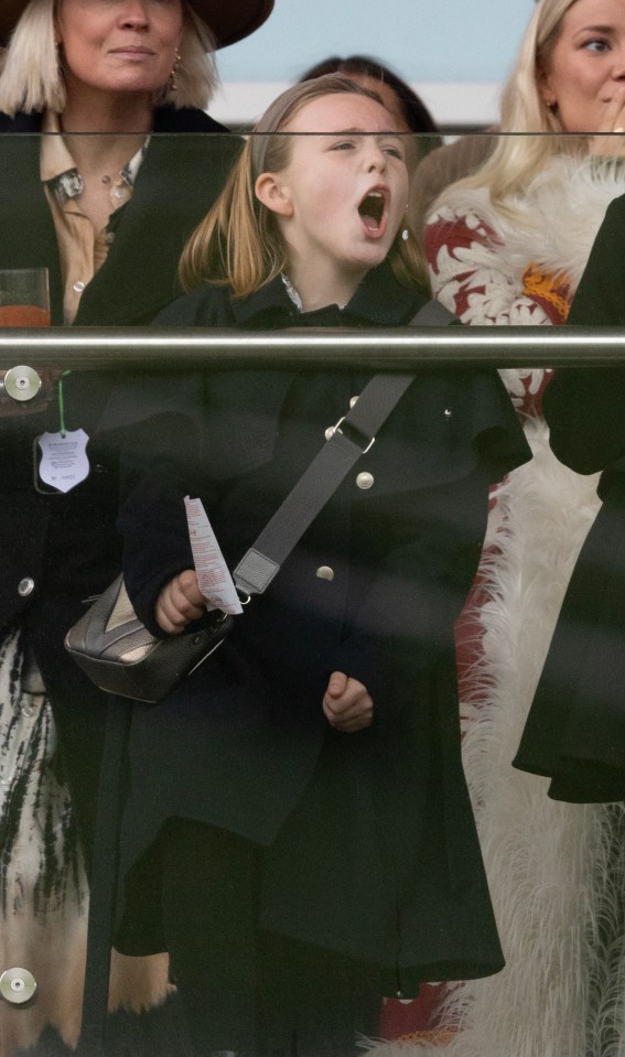 Mia Tindall could be seen cheering as she watched the races at Cheltenham today