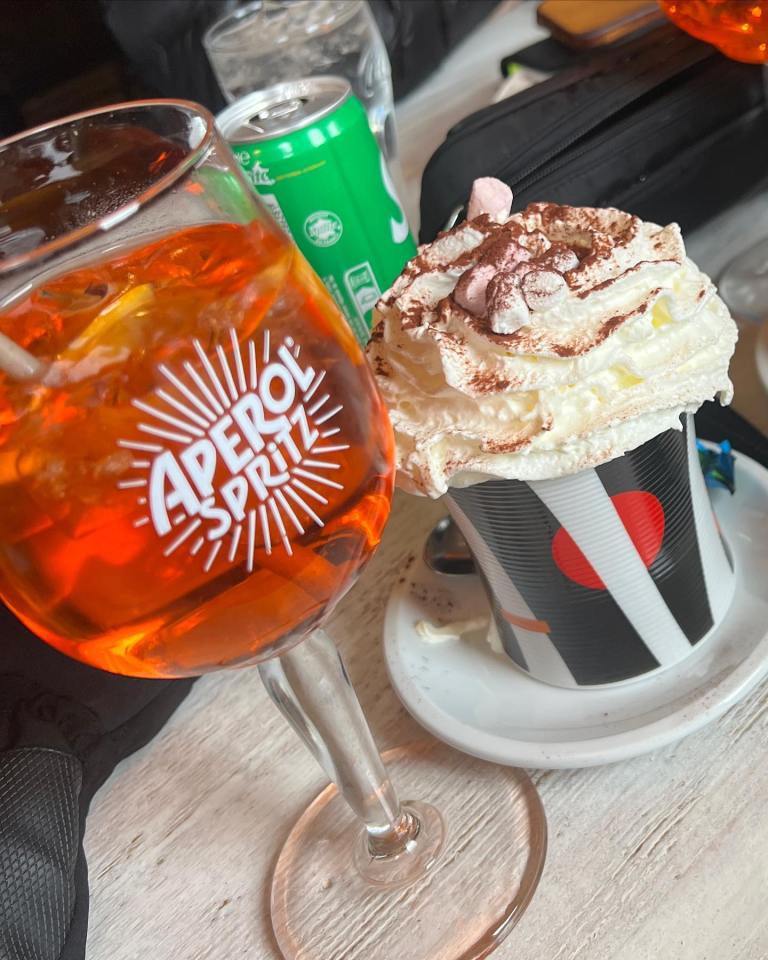 After a day on the slopes, Michelle enjoyed an Aperol Spritz and a hot chocolate