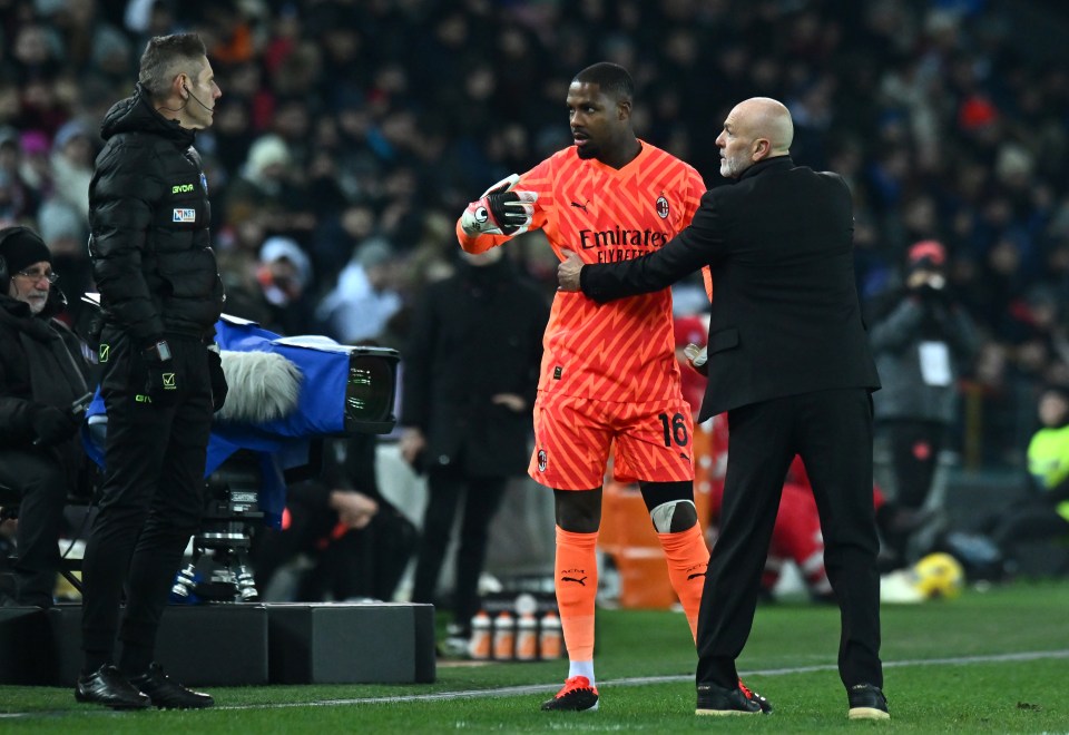 Maignan walked off the pitch with his team-mates