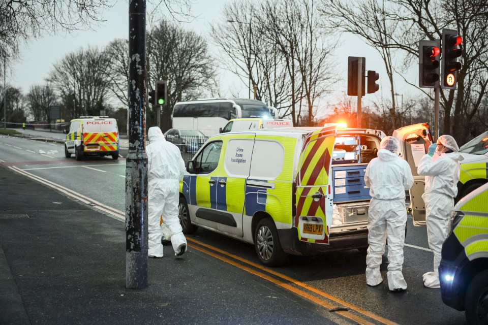 Police on Kingsway, East Didsbury, south Manchester, where a man was assaulted