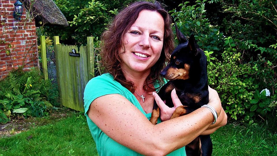 Natalie with miniature Pinscher dog Shizza, who inspired the creation of Road Refresher