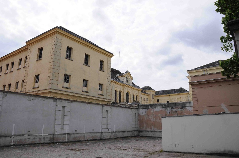 He was seen visiting several cafes near Sankt Poelten Prison (pictured) where the monster is currently jailed