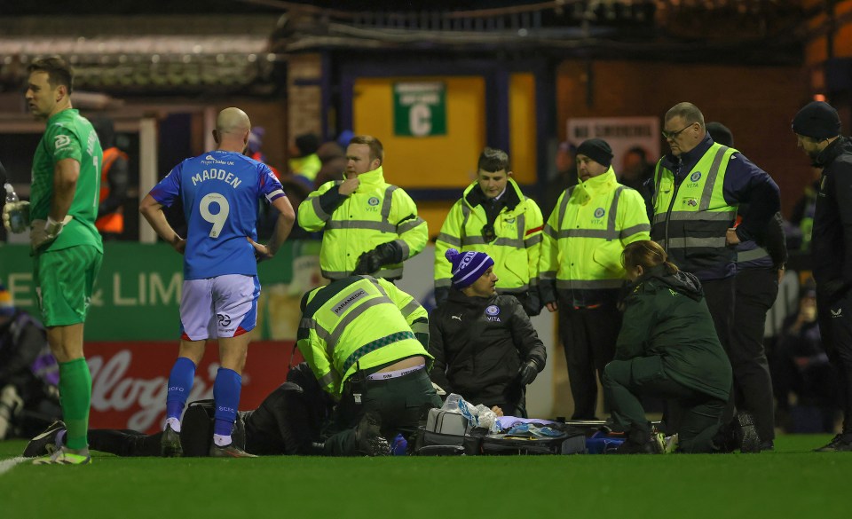 The defender was given oxygen as he received treatment for several minutes