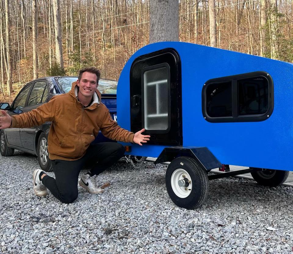 Chay said he was able to sleep inside the camper despite his bulky frame