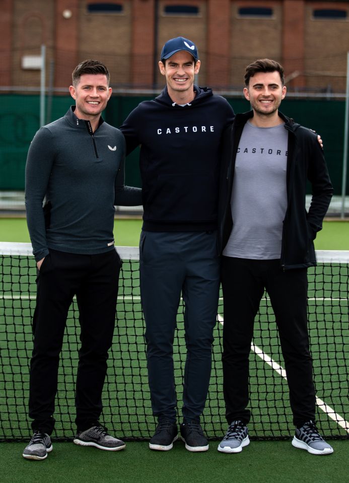 Andy Murray pictured alongside Tom and Phil Beahon