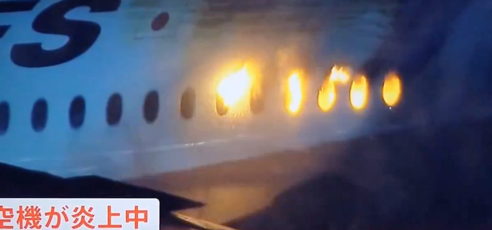 Flames erupted from inside the plane as it landed on the runway