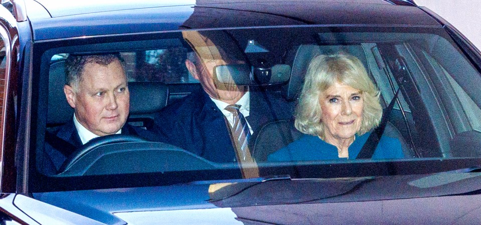 Queen Camilla put on a brave face as she left the hospital after visiting Charles