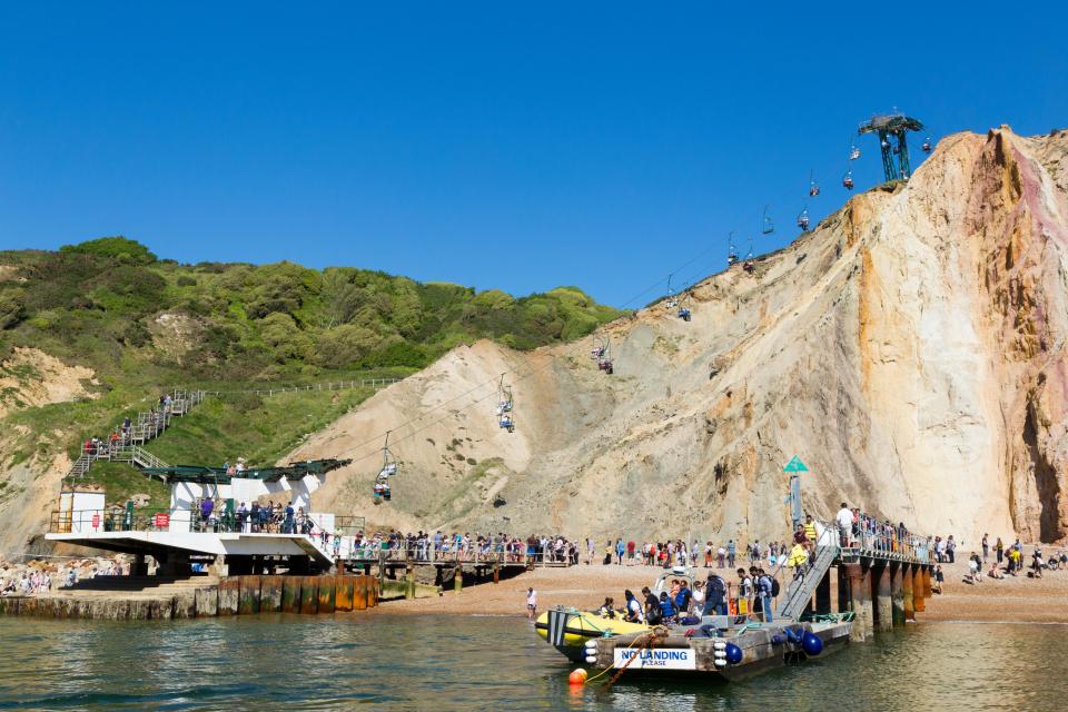 A beach in the UK has a unique way of getting down to the sand - by chairlift