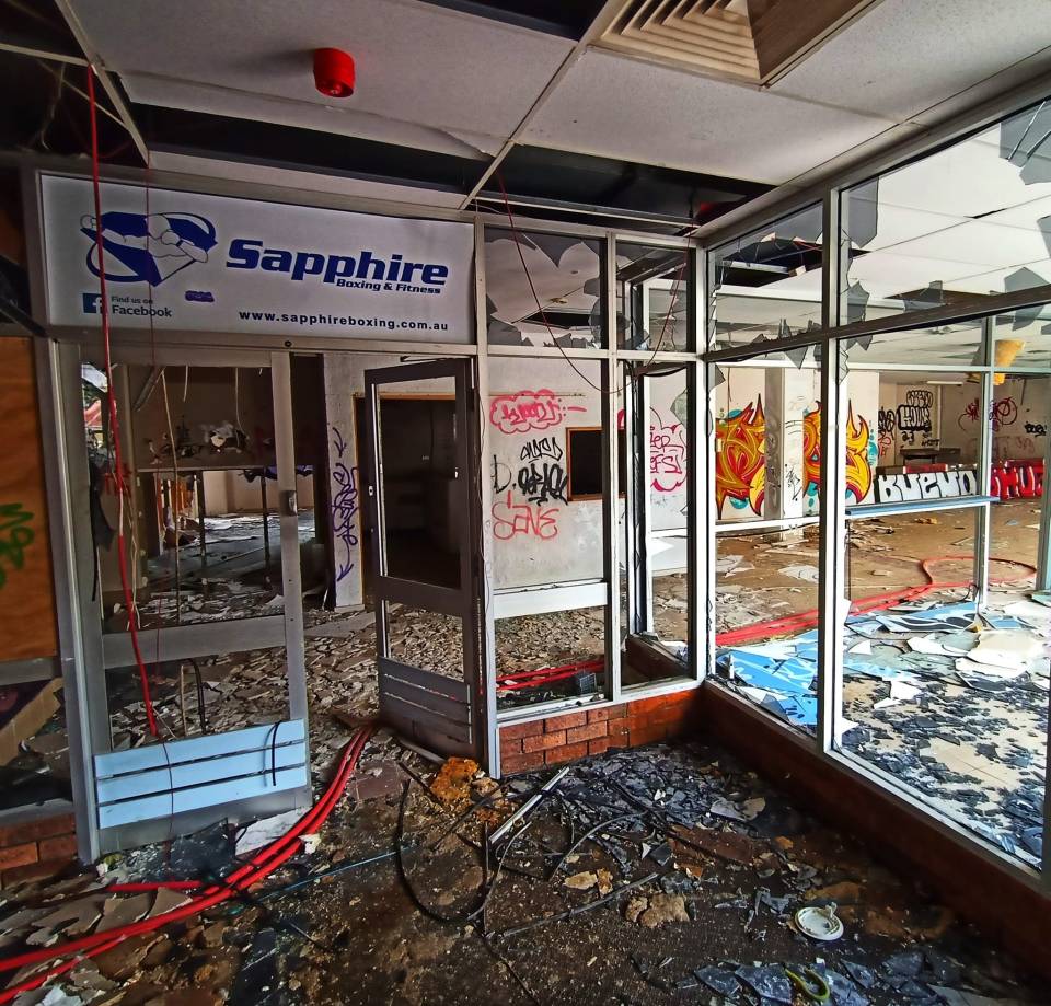 Destroyed shop fronts are the only reminder of the mall's former days