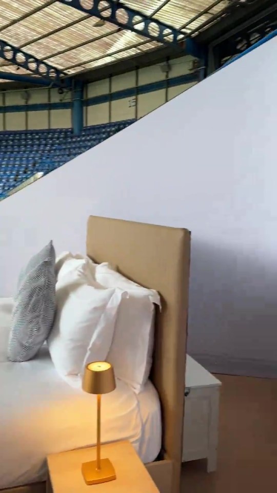 A Hilton Hotels bed was placed on the balcony of the Matthew Harding Stand