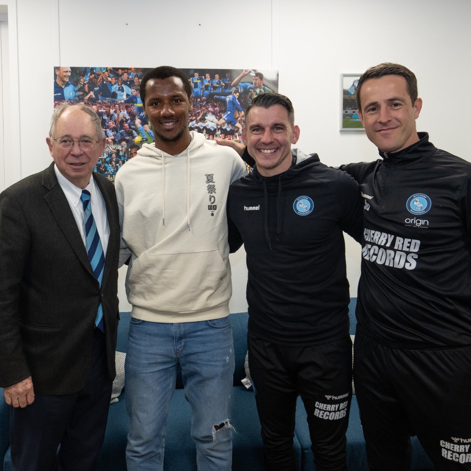 Richard Kone, with Bloomfield next to him on his left, has signed for Wycombe