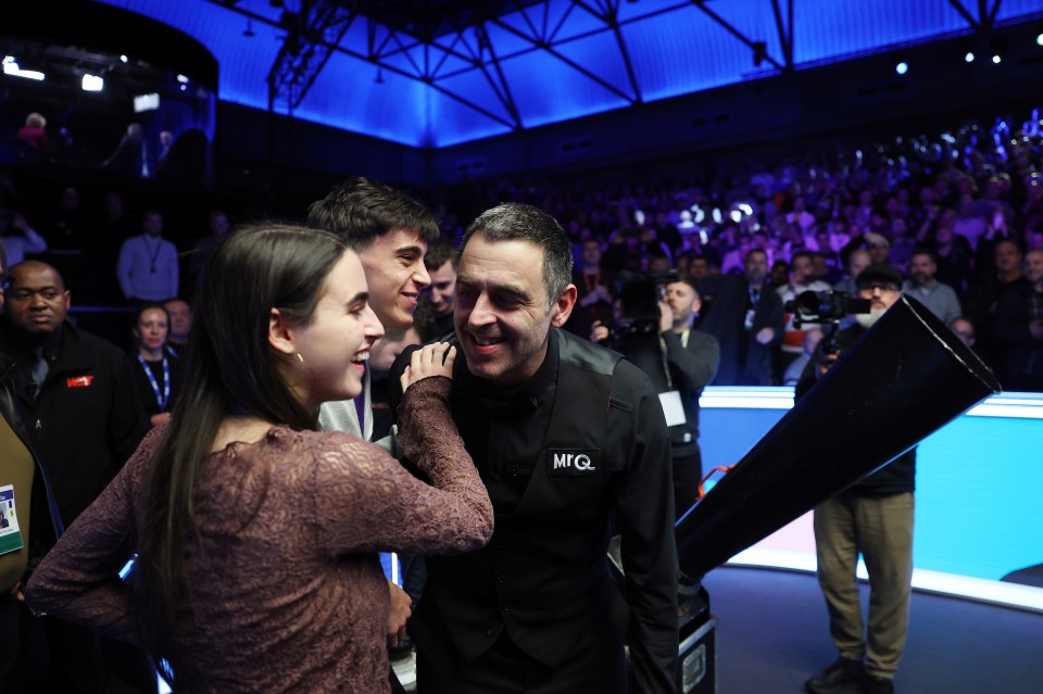 Ronnie's kids were on hand to help him lift the trophy