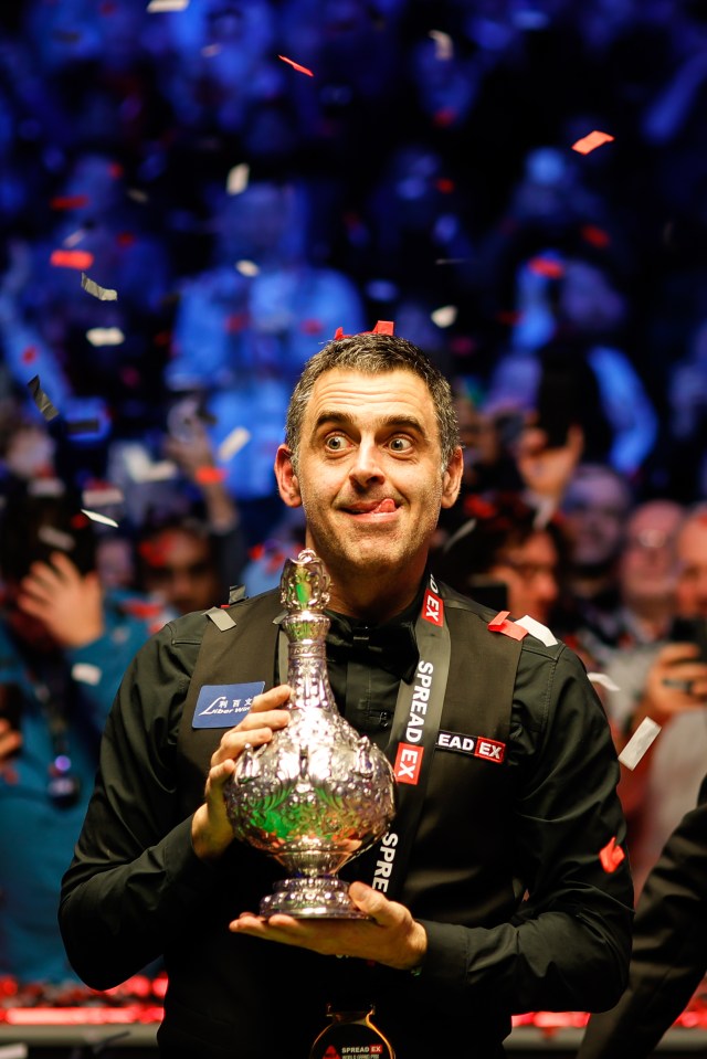 Ronnie O’Sullivan celebrates coming from 4-0 down to beat World No2 Judd Trump 10-7 in the final of the World Grand Prix