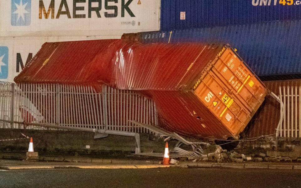 A Maersk shipping container tumbled onto a fence in the port of Dublin